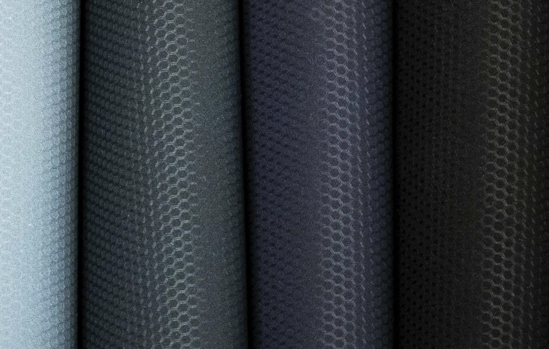 close up image of Supplement Tubes in Carbon, Fabric impression, Perlage
